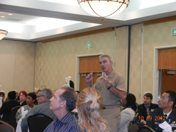 Rear Adm. Gordon Russell, USN, deputy commander for Reserve Component of Navy Cyber Forces and commander for the Information Dominance Corps Reserve Command, presents to the chapter in October.